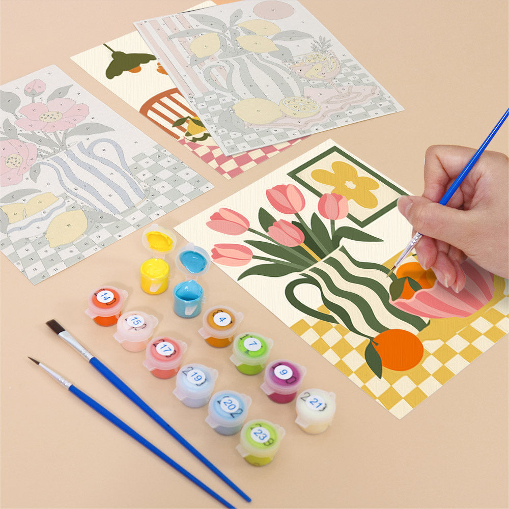 Filling in a Checkerboard Still Life mini canvas with numbered acrylic paints and a fine brush