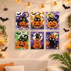 Six finished Checkered Cat Pumpkins mini paintings hung on a wall above a table
