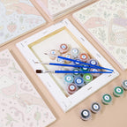 Numbered paint pots and brushes on a pre-stretched Cheers and Treats mini canvas