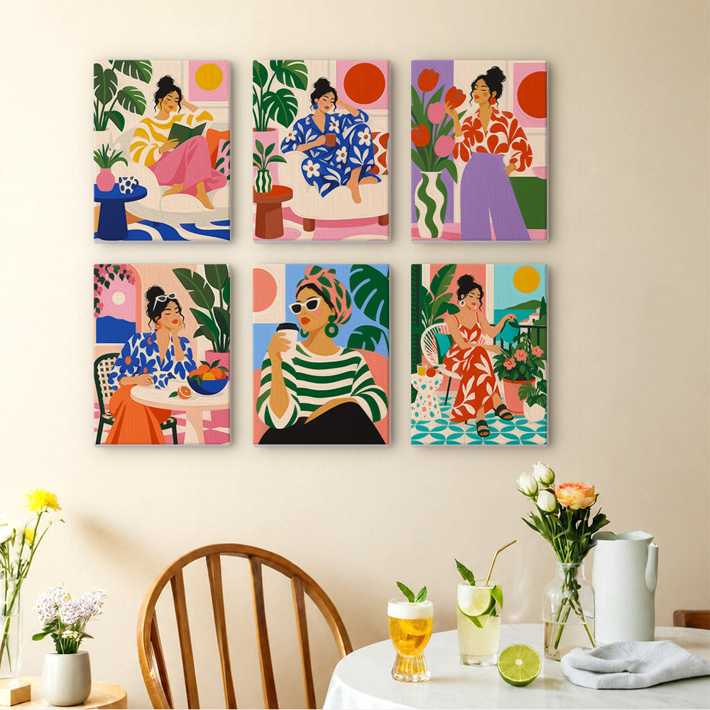 Chic at Home mini paintings displayed as a gallery wall in a sunny kitchen