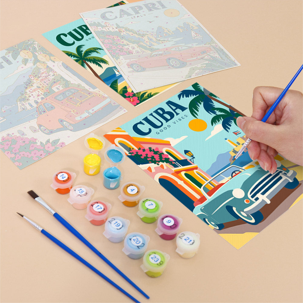 Filling in a Classic Car Getaways mini canvas with numbered acrylic paints and a fine brush