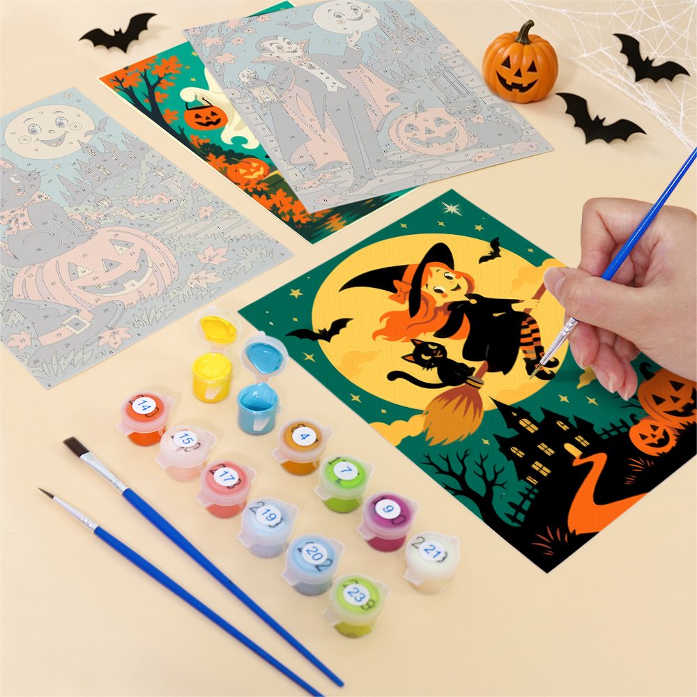 Filling in a Classic Monster Moon mini canvas with numbered acrylic paints and a fine brush