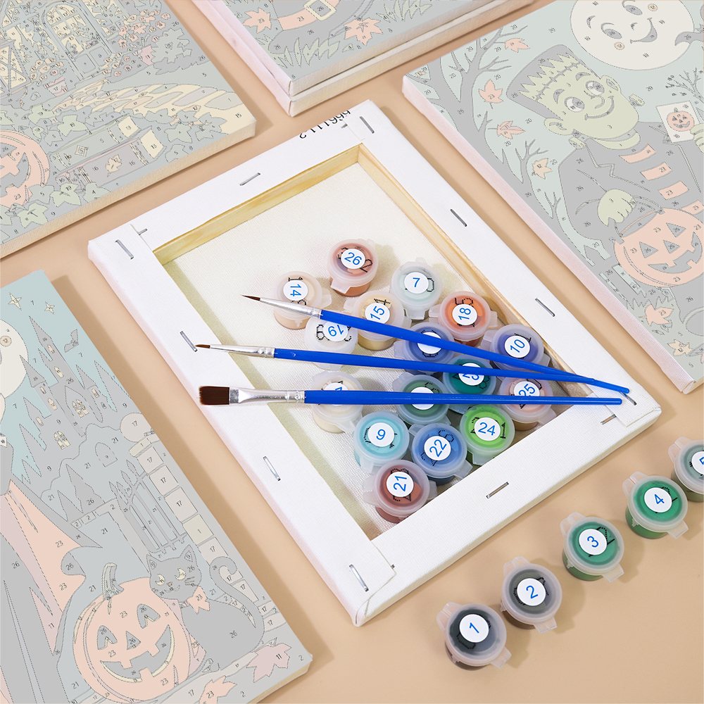 Numbered paint pots and brushes on a pre-stretched Classic Monster Moon mini canvas