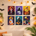 Six finished Classic Spooky Nights mini paintings hung on a wall above a table