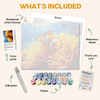 What's included in the Clownfish Haven paint by numbers kit: numbered linen canvas, reference sheet, color guide, 24 acrylic paints, 3 brushes and thank you card