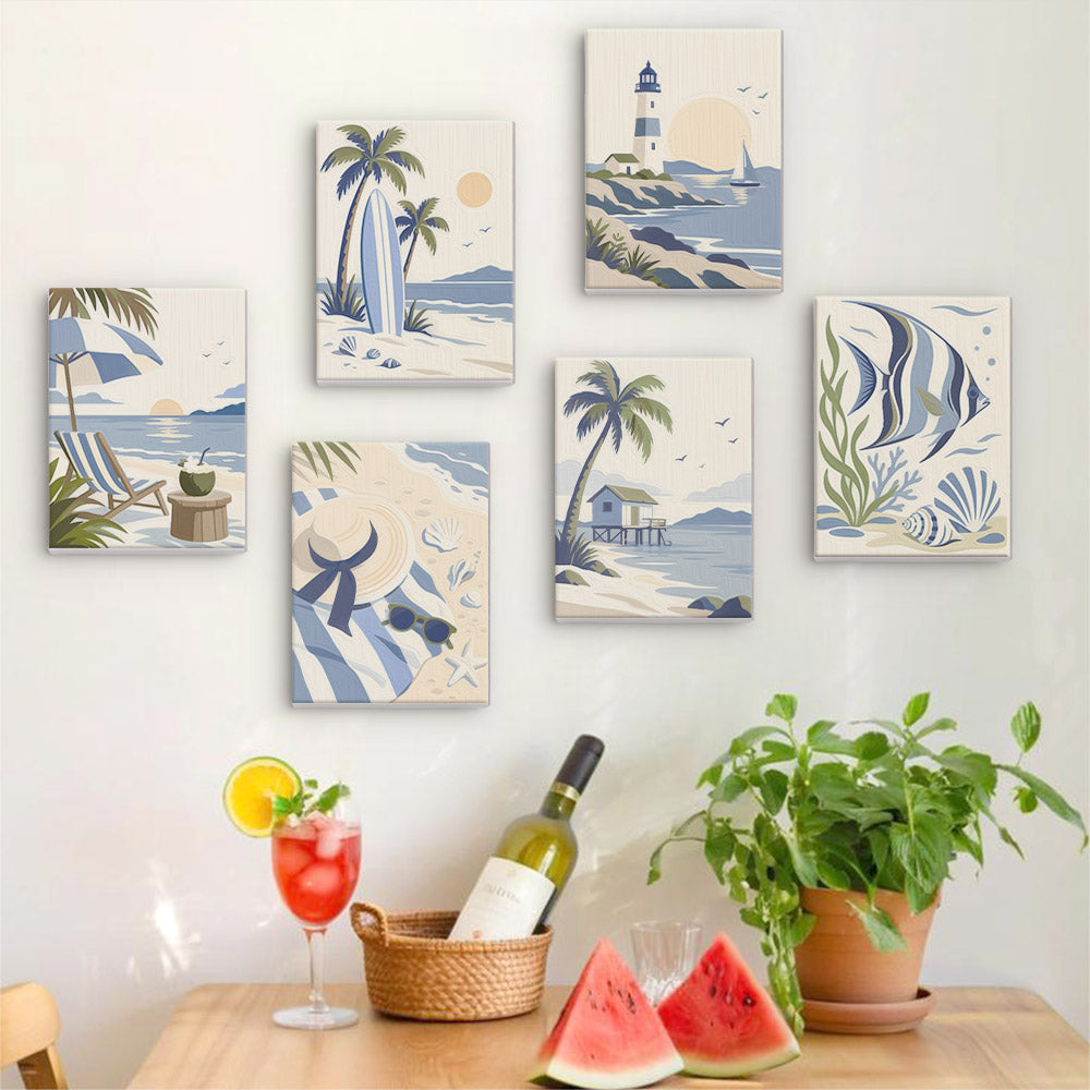 Six finished Coastal Blues mini paintings hung on a wall above a table