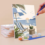 Painting a Coastal Blues mini canvas propped up beside numbered acrylic paints