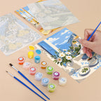 Filling in a Coastal Breakfast mini canvas with numbered acrylic paints and a fine brush