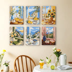 Coastal Breakfast mini paintings displayed as a gallery wall in a sunny kitchen