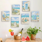 Six finished Coastal Whites mini paintings hung on a wall above a table