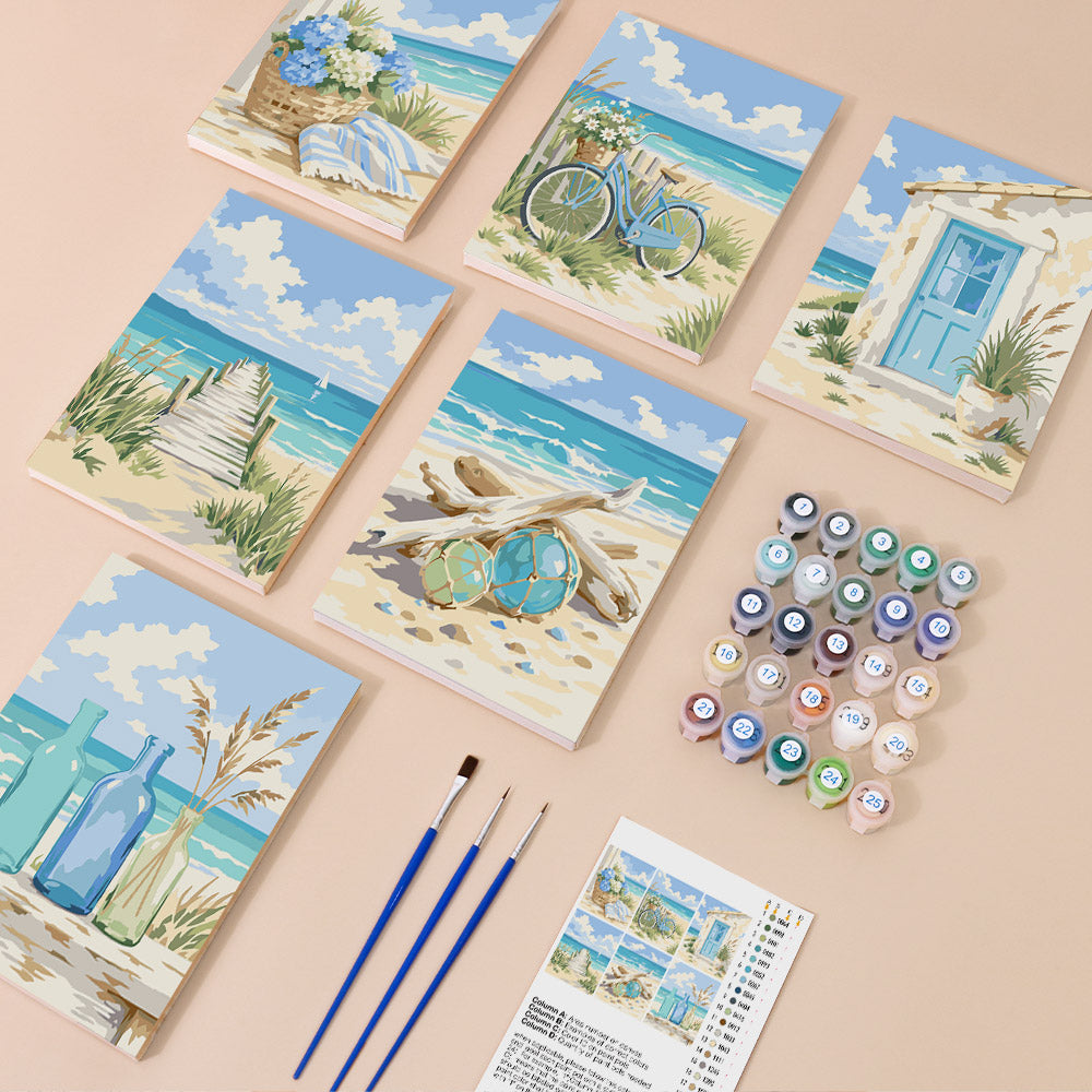 Coastal Whites mini paint by numbers kit with six numbered canvases, acrylic paints, brushes and layout