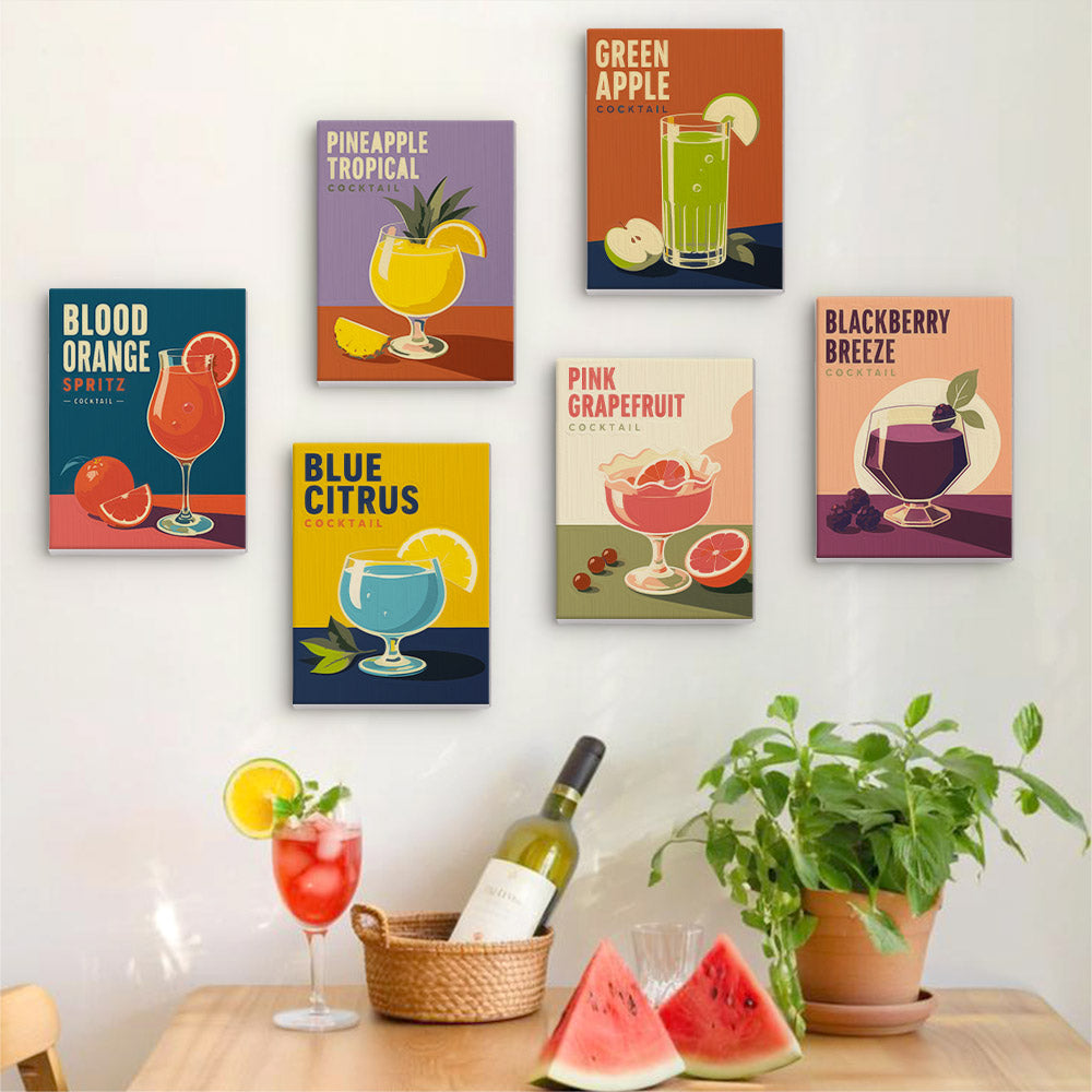 Six finished Cocktail Hour mini paintings hung on a wall above a table