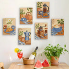 Six finished Coffee Corner mini paintings hung on a wall above a table