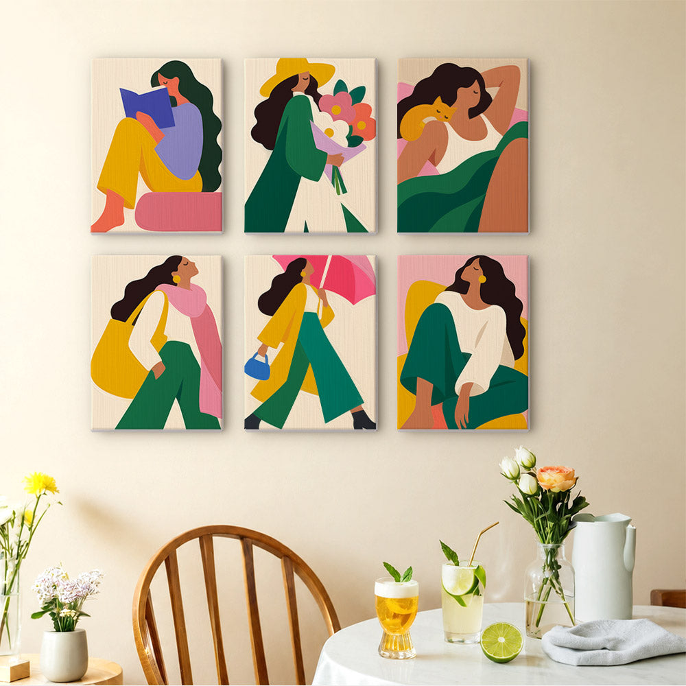 Color Block Ladies mini paintings displayed as a gallery wall in a sunny kitchen