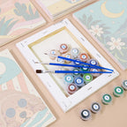 Numbered paint pots and brushes on a pre-stretched Cool Summer Vibes mini canvas