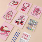 Coquette Keepsakes mini paint by numbers set with six pink canvases, acrylic paints, brushes and reference layout