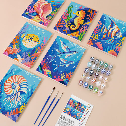 Coral Reef Treasures mini paint by numbers kit with six numbered canvases, acrylic paints, brushes and layout