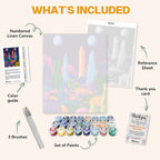 What's included in the Cosmic Crystal Oasis paint by numbers kit: numbered linen canvas, reference sheet, color guide, 24 acrylic paints, 3 brushes and thank you card