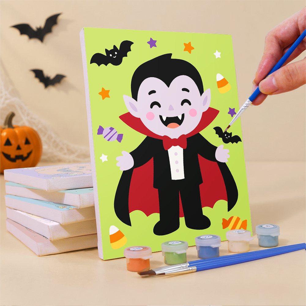 Painting a Costume Cuties mini canvas propped up beside numbered acrylic paints