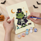 Numbered paint pots and brushes on a pre-stretched Costumed Frog Friends mini canvas