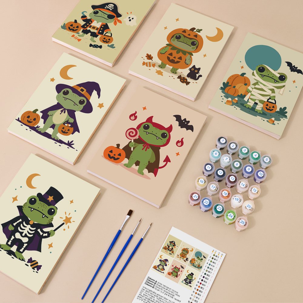 Painting one of the Costumed Frog Friends designs next to a stack of mini canvases