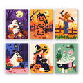 Cozy Autumn Spooks mini paint by numbers set: six cozy autumn Halloween scenes with a campfire ghost, black cats in pumpkins, a scarecrow, a witch and a skeleton