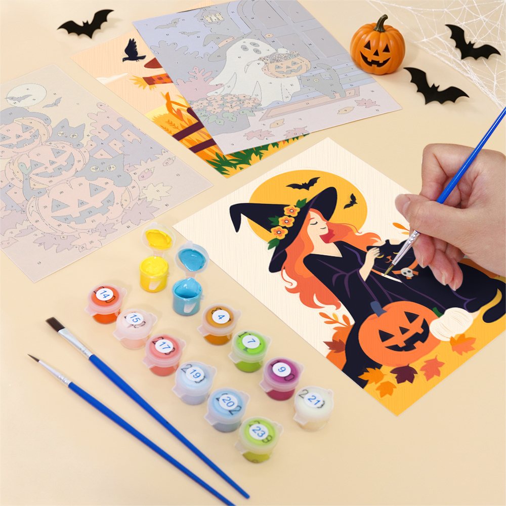Filling in a Cozy Autumn Spooks mini canvas with numbered acrylic paints and a fine brush