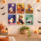 Cozy Autumn Spooks mini paintings displayed as a gallery wall in a sunny kitchen