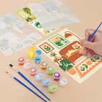 Filling in a Cozy Cat Home mini canvas with numbered acrylic paints and a fine brush
