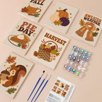 Cozy Fall mini paint by numbers kit with six numbered canvases, acrylic paints, brushes and layout