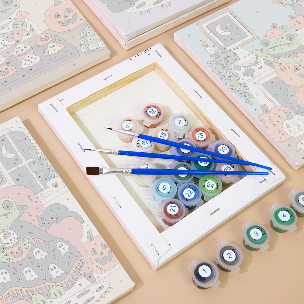 Numbered paint pots and brushes on a pre-stretched Cozy Frog Halloween mini canvas
