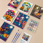 Painting one of the Cozy Haunted Home designs next to a stack of mini canvases