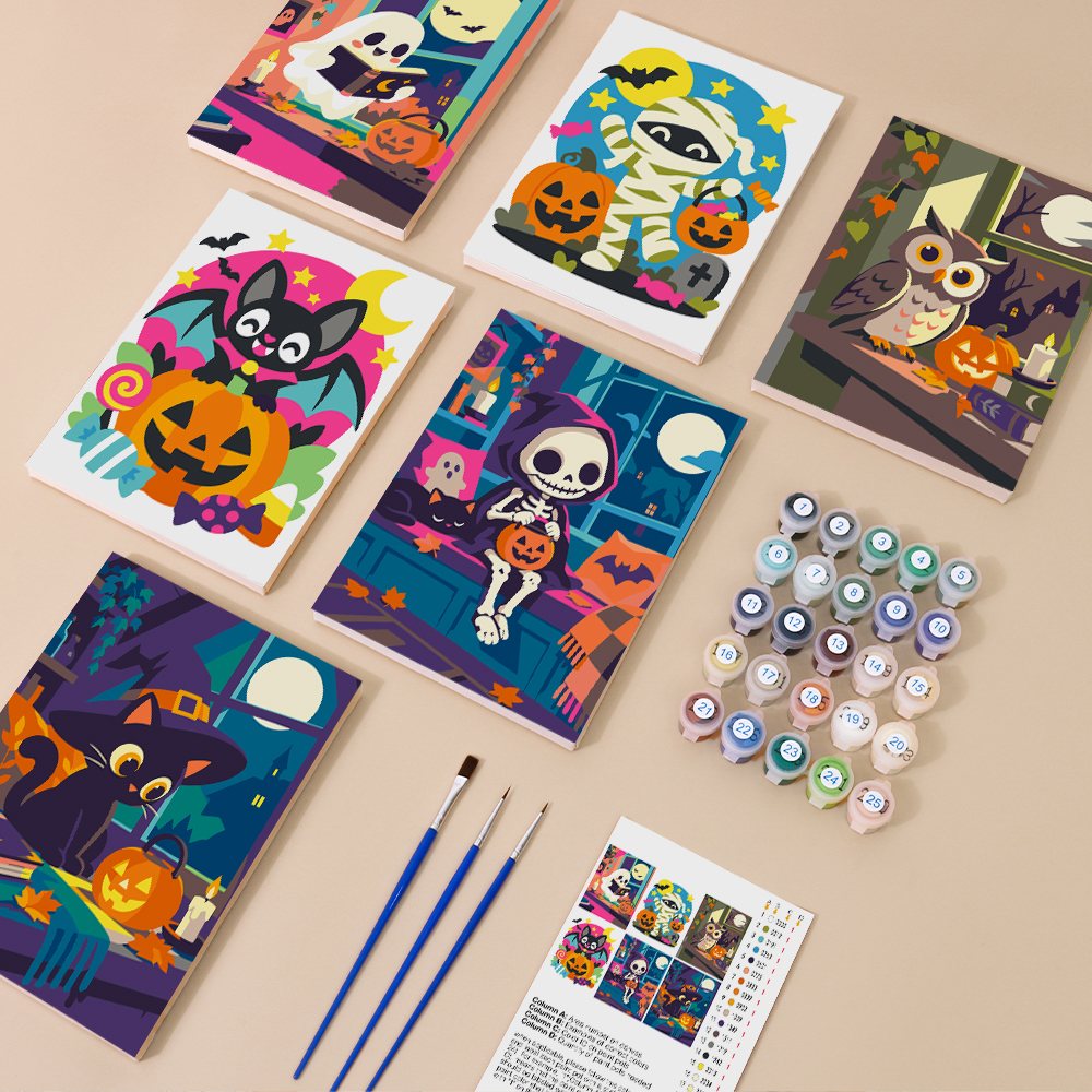 Painting one of the Cozy Haunted Home designs next to a stack of mini canvases