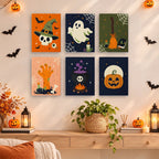 Creepy Classics mini paintings displayed as a gallery wall in a sunny kitchen