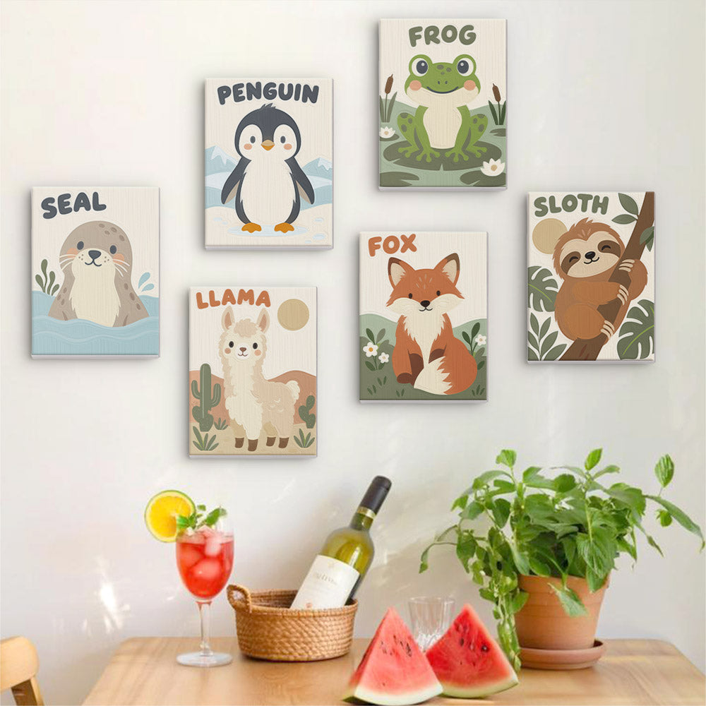 Six finished Critter Cards mini paintings hung on a wall above a table