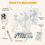 What's included in the Dalmatian in Thought paint by numbers kit: numbered linen canvas, reference sheet, color guide, 24 acrylic paints, 3 brushes and thank you card