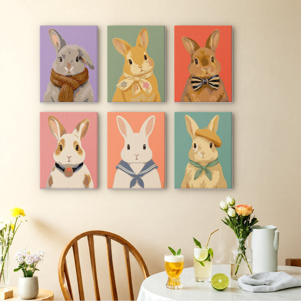 Dapper Bunnies mini paintings displayed as a gallery wall in a sunny kitchen