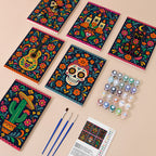 Día de Muertos mini paint by numbers kit with six numbered canvases, acrylic paints, brushes and layout