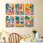 Dogs at Home mini paintings displayed as a gallery wall in a sunny kitchen