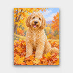 Doodle in the Leaves paint by numbers kit of a curly golden doodle sitting in a pile of orange autumn leaves