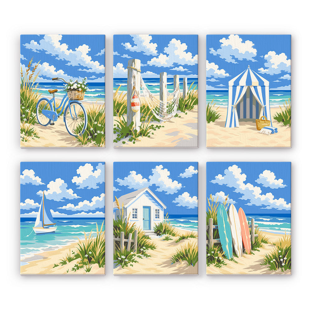 Dune Paths mini paint by numbers set: six designs of a bicycle, beach fence, striped cabana, sailboat, cottage and surfboards