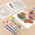 Filling in an Earthy Leaves mini canvas with numbered acrylic paints and a fine brush