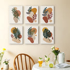 Earthy Leaves mini paintings displayed as a gallery wall in a sunny kitchen