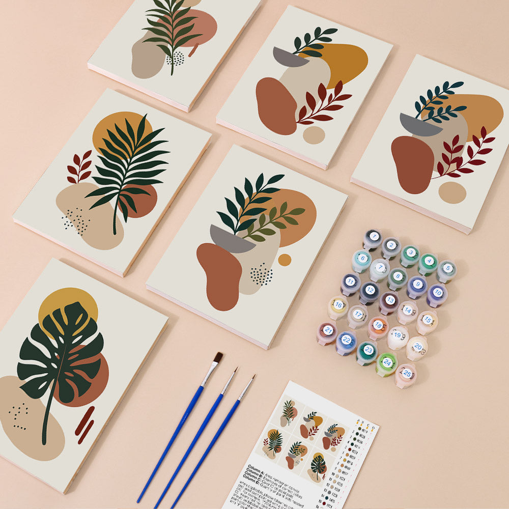 Earthy Leaves mini paint by numbers kit with six numbered canvases, acrylic paints, brushes and layout