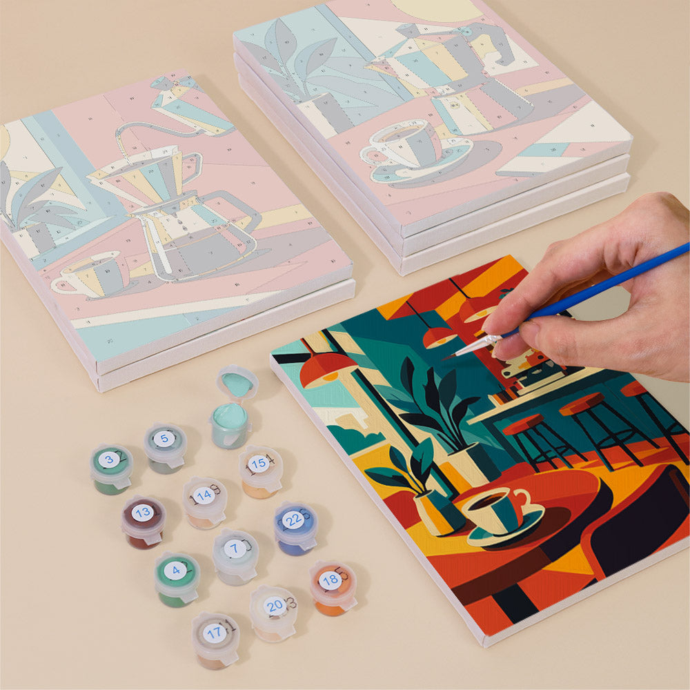 Painting one of the Espresso Bar designs next to a stack of mini canvases