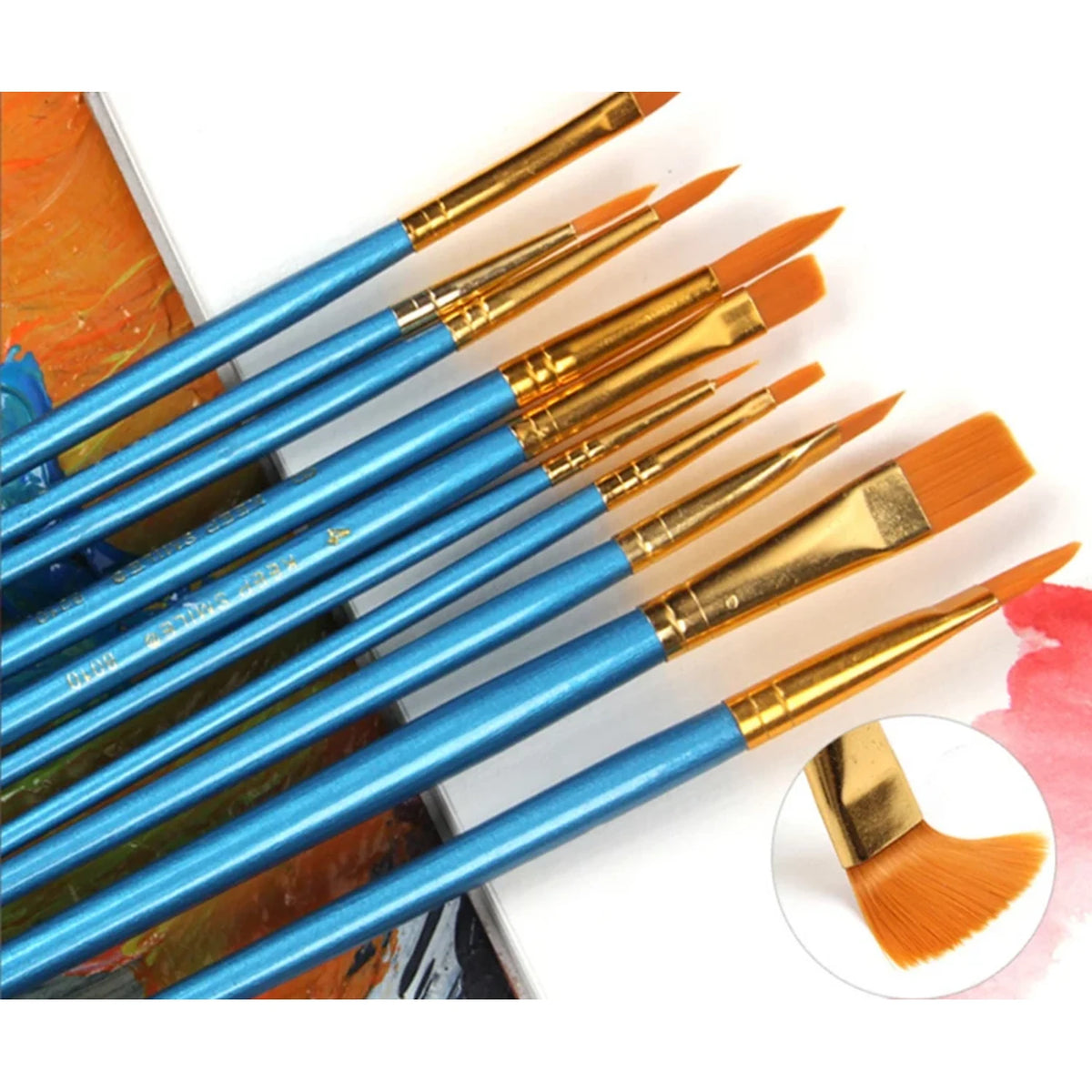 10 nylon paint brushes for paint by numbers with gold ferrules and an angled flat brush close-up