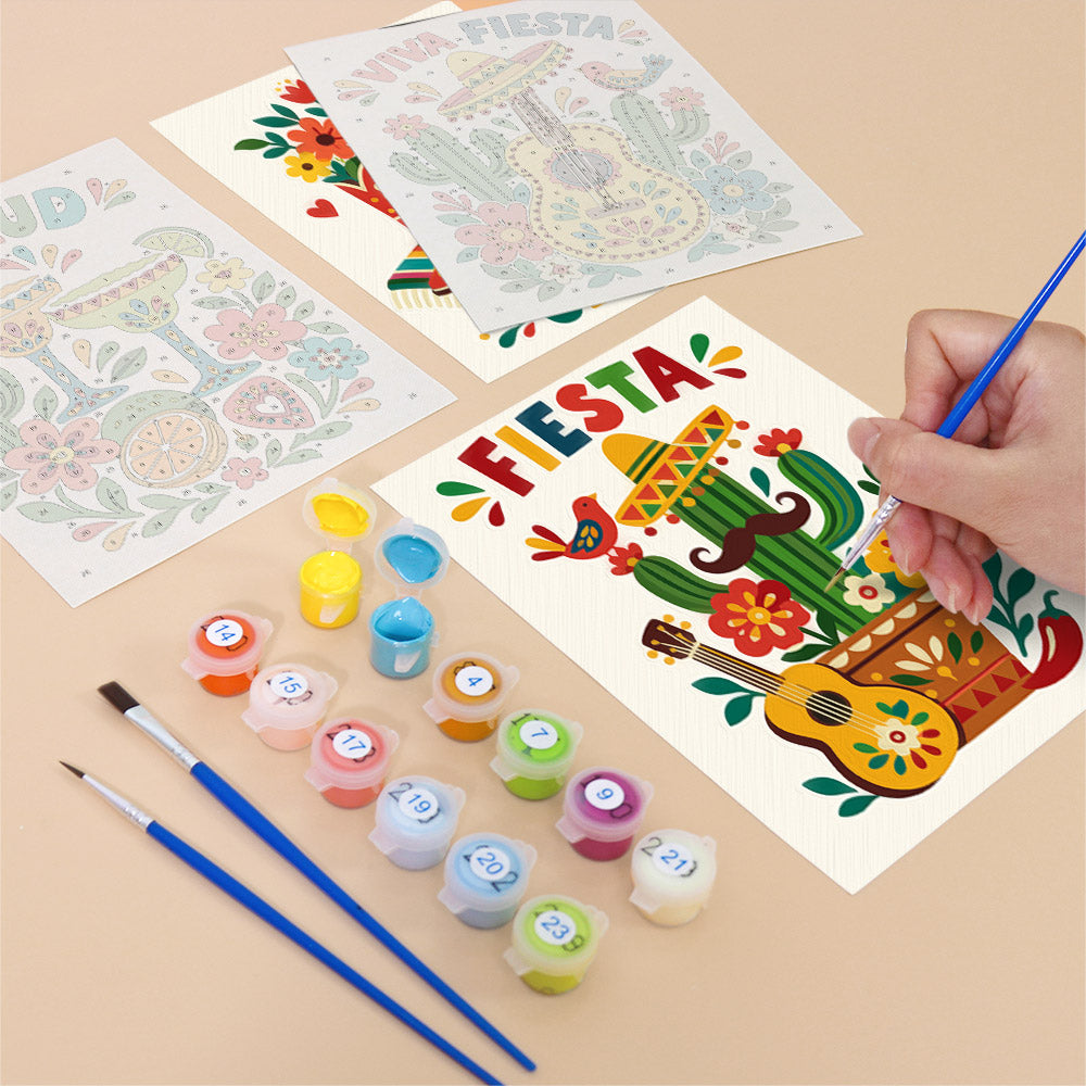 Filling in a Fiesta Time mini canvas with numbered acrylic paints and a fine brush
