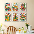 Fiesta Time mini paintings displayed as a gallery wall in a sunny kitchen