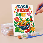 Painting a Fiesta Time mini canvas propped up beside numbered acrylic paints