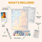What's included in the Flames and Winds paint by numbers kit: numbered linen canvas, reference sheet, color guide, 24 acrylic paints, 3 brushes and thank you card